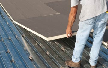 benefits of insulating Ballynaskeagh flat roofing