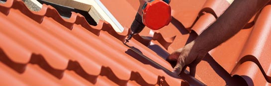 save on Ballynaskeagh roof installation costs